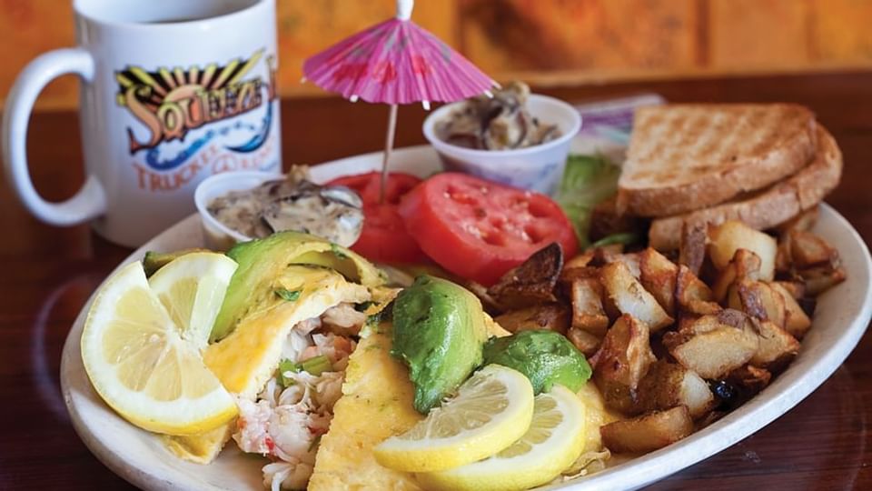 A platter & drink of Squeeze In near Legacy Vacation Resorts