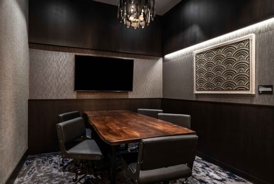 modern boardroom with long wooden table