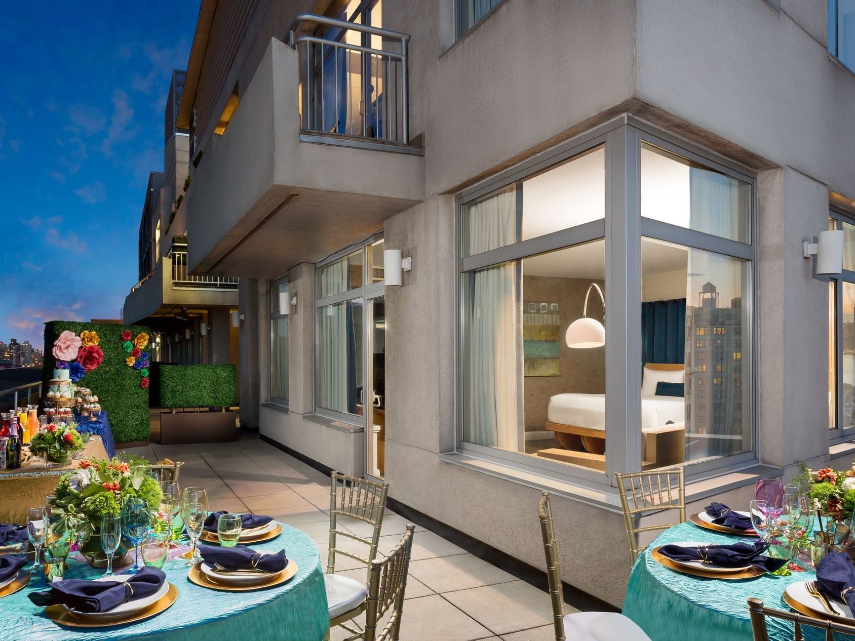 tables and chairs on a hotel balcony