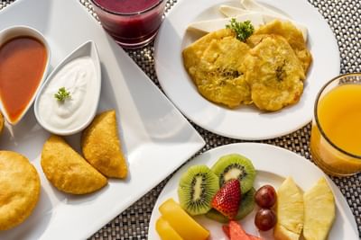 Close-up of served morning snacks on a table at Hotel Isla Del Encanto