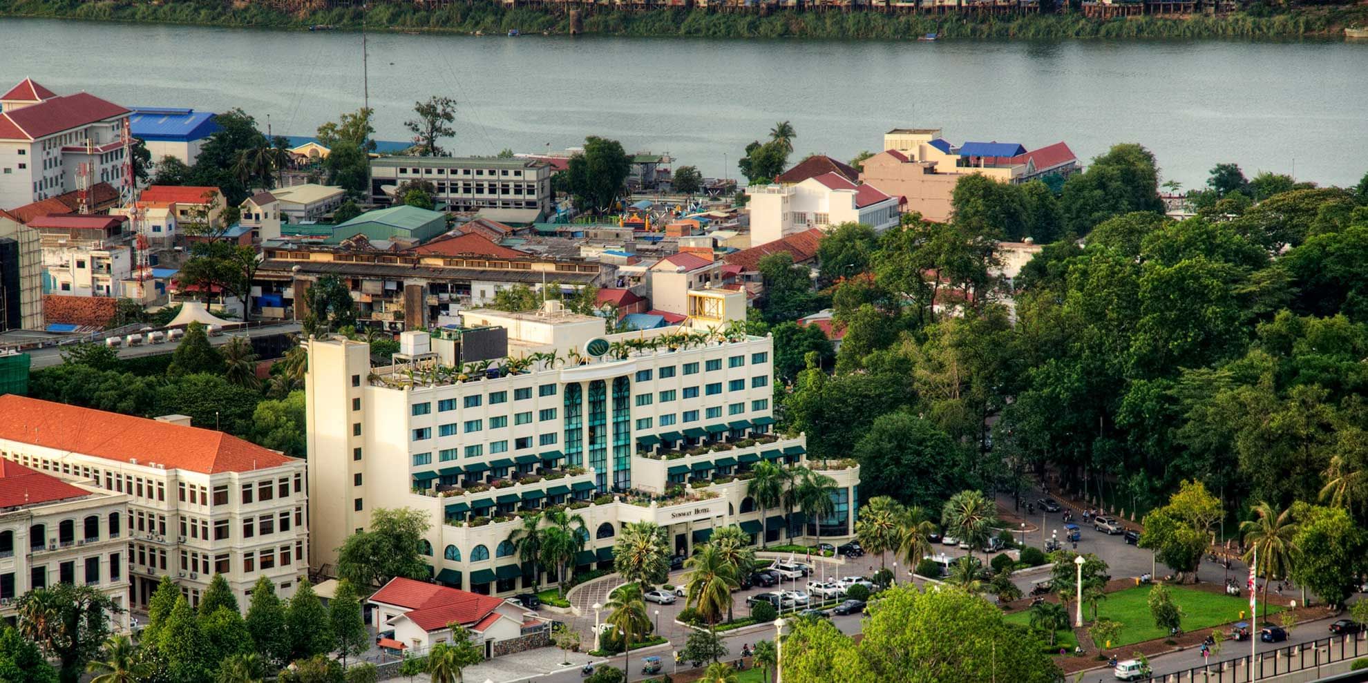 Aerial view of Sunway Hotel Phnom Penh, car park & city