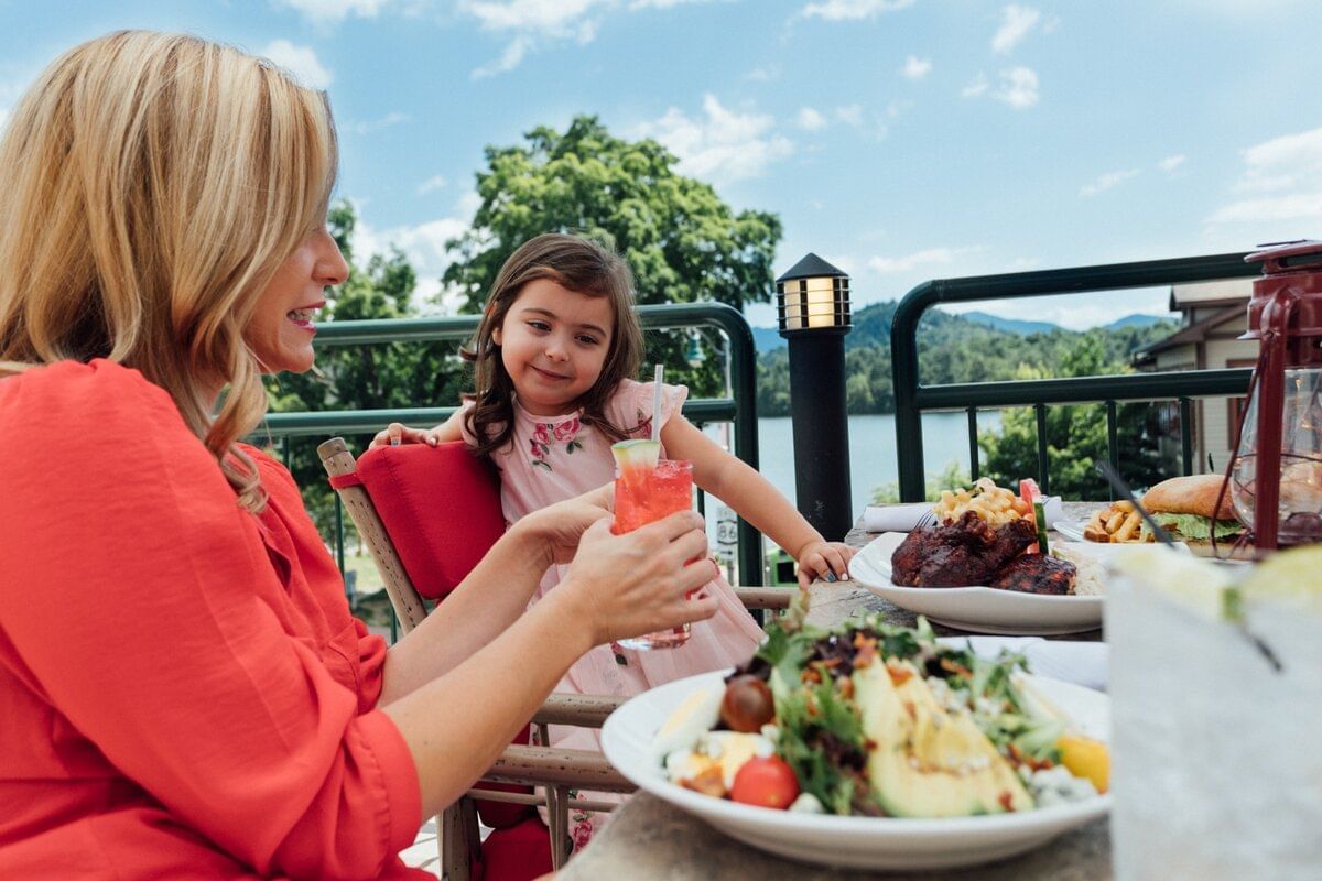 Mom & daughter outdoor dining at High Peaks Resort