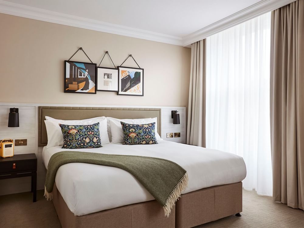 Double bed in Deluxe Room at The Clermont Victoria Hotel