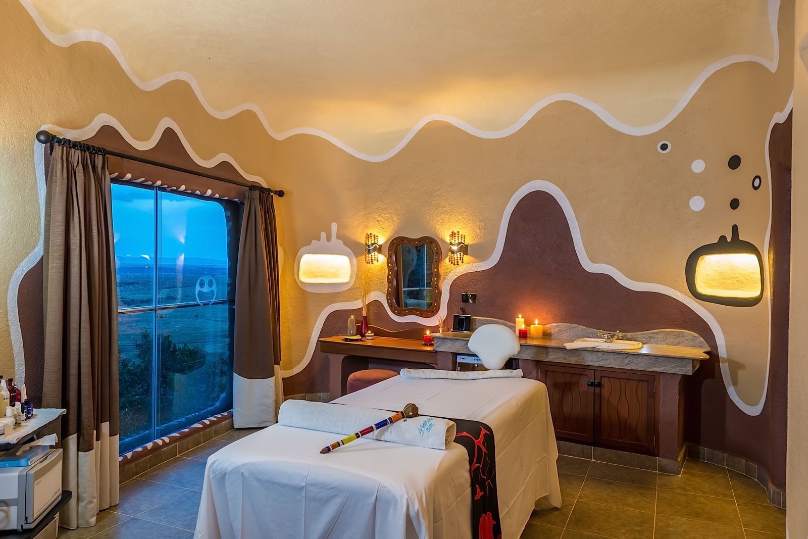 View of a treatment room with a bed at Mara Serena Safari Lodge