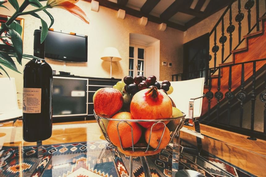 Closeup of Fruits & wine bottle at Pervanovo Celenga Apartments