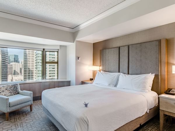 Hotel guestroom with king bed