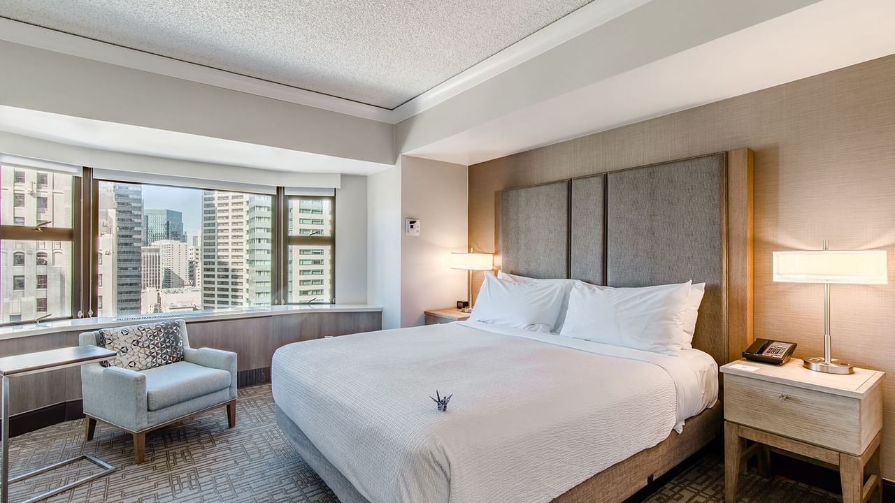 Hotel guestroom with king bed