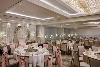 Wedding venue with banquet tables and floral decorations at York Hotel Singapore