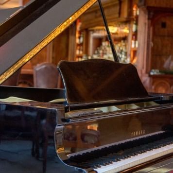 Piano in a restaurant at Horton Grand Hotel