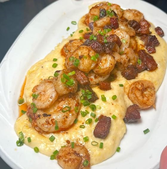 A plate of shrimp and grits from Blue collar  in MiMo District, Miami