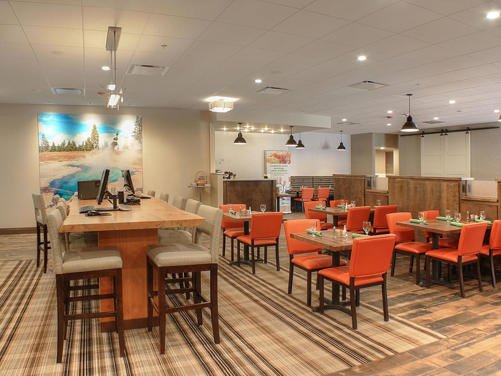 Dining area with tables and chairs in QT's Restaurant at Buffalo Bill Village - Cody.