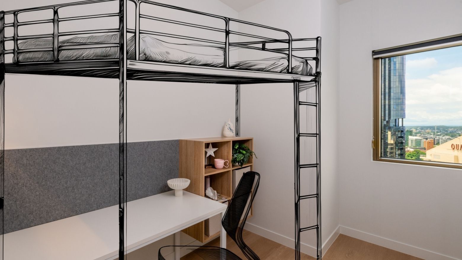 Modern room with bunk bed, desk, chair, and cityscape view at UniLodge Brisbane City.