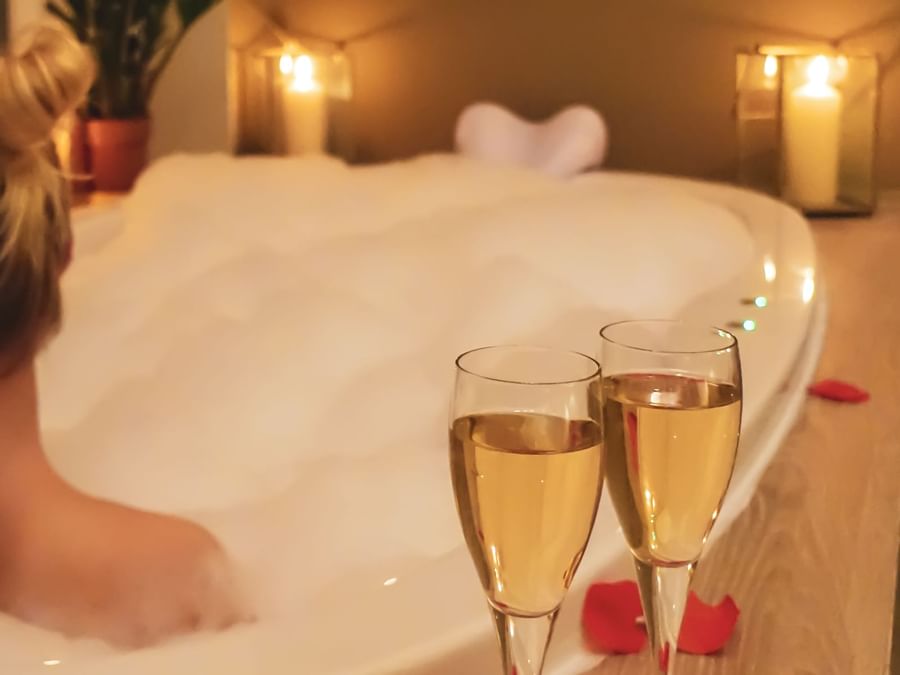 Champagne in Deluxe Jacuzzi double room at The Originals Hotels