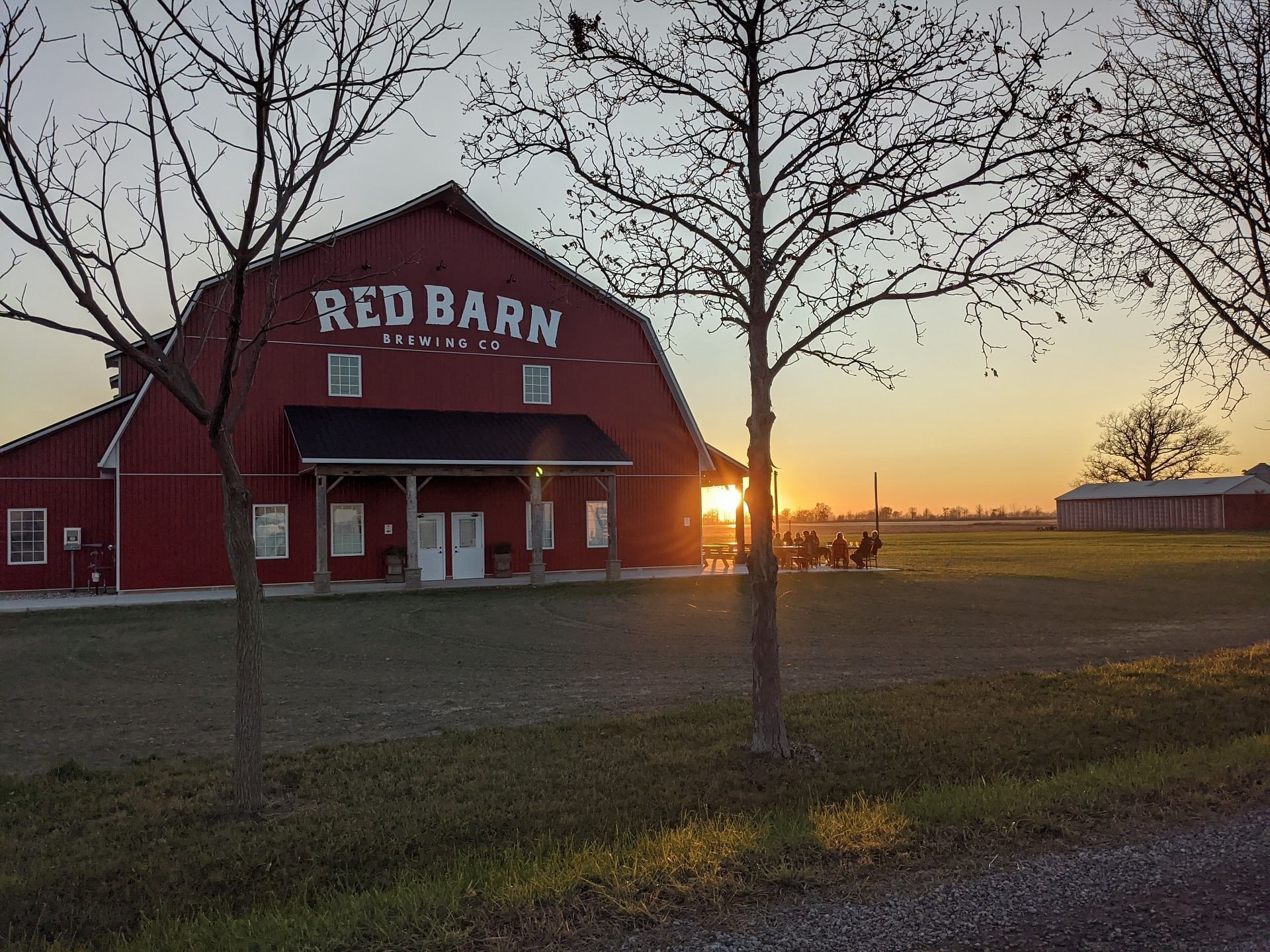 View of Red Barn Brewing during sunset near Retro Hotel