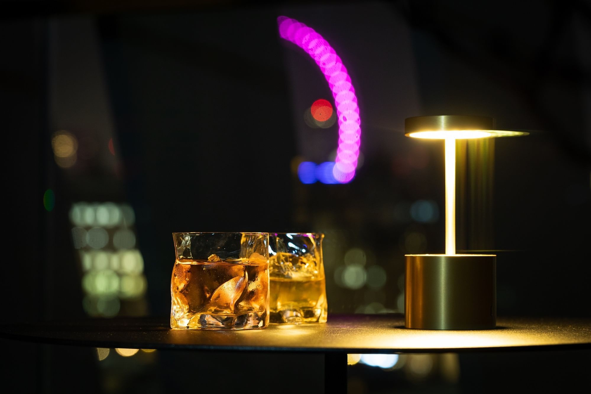 Glasses with whisky and ice cubes served at The Londoner