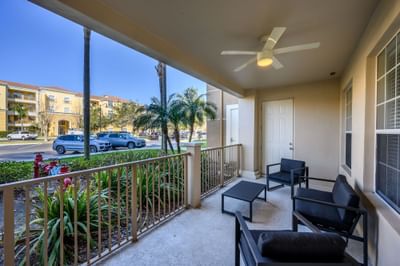 Outdoor balcony with patio furniture and a view of the resort at Vista Cay Resort By Millenium