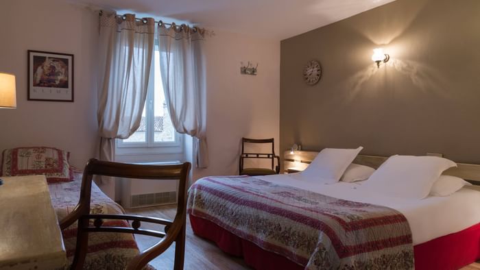 Bed & furniture in Hotel du Parc room at The Original Hotels 