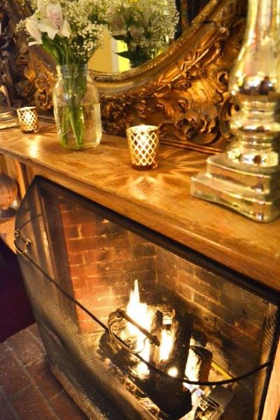 Close-up of a fireplace in the Side Room at The Inn at Saratoga