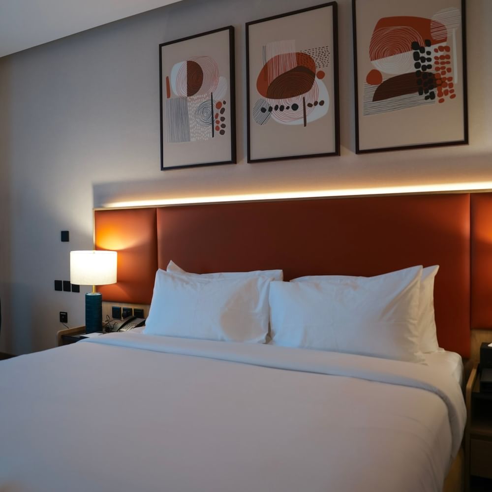 Elegant Standard Room with modern decor and cozy ambiance at Warwick Hotel & Spa Jeddah.