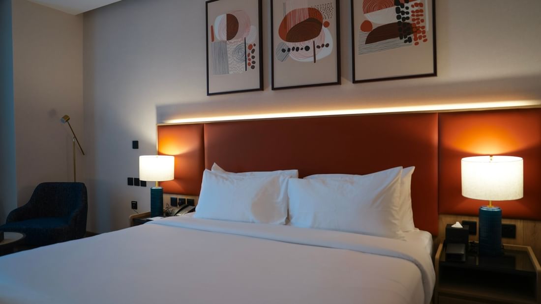 Elegant Standard Room with modern decor and cozy ambiance at Warwick Hotel & Spa Jeddah.