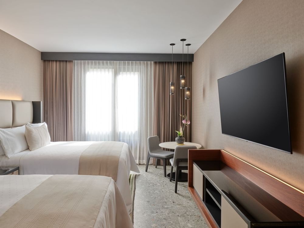 Deluxe Room with 2 double beds & TV at Grand Fiesta Americana
