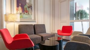 Conversation Chairs with rounded small table at Hotel Le Pariou