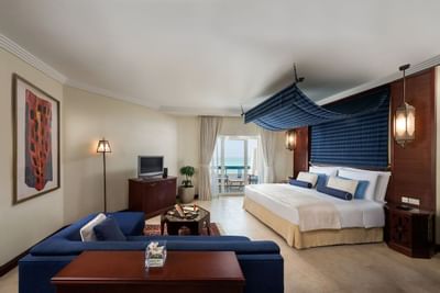 Large bed, Junior suite with sea view at Hotel Ajman