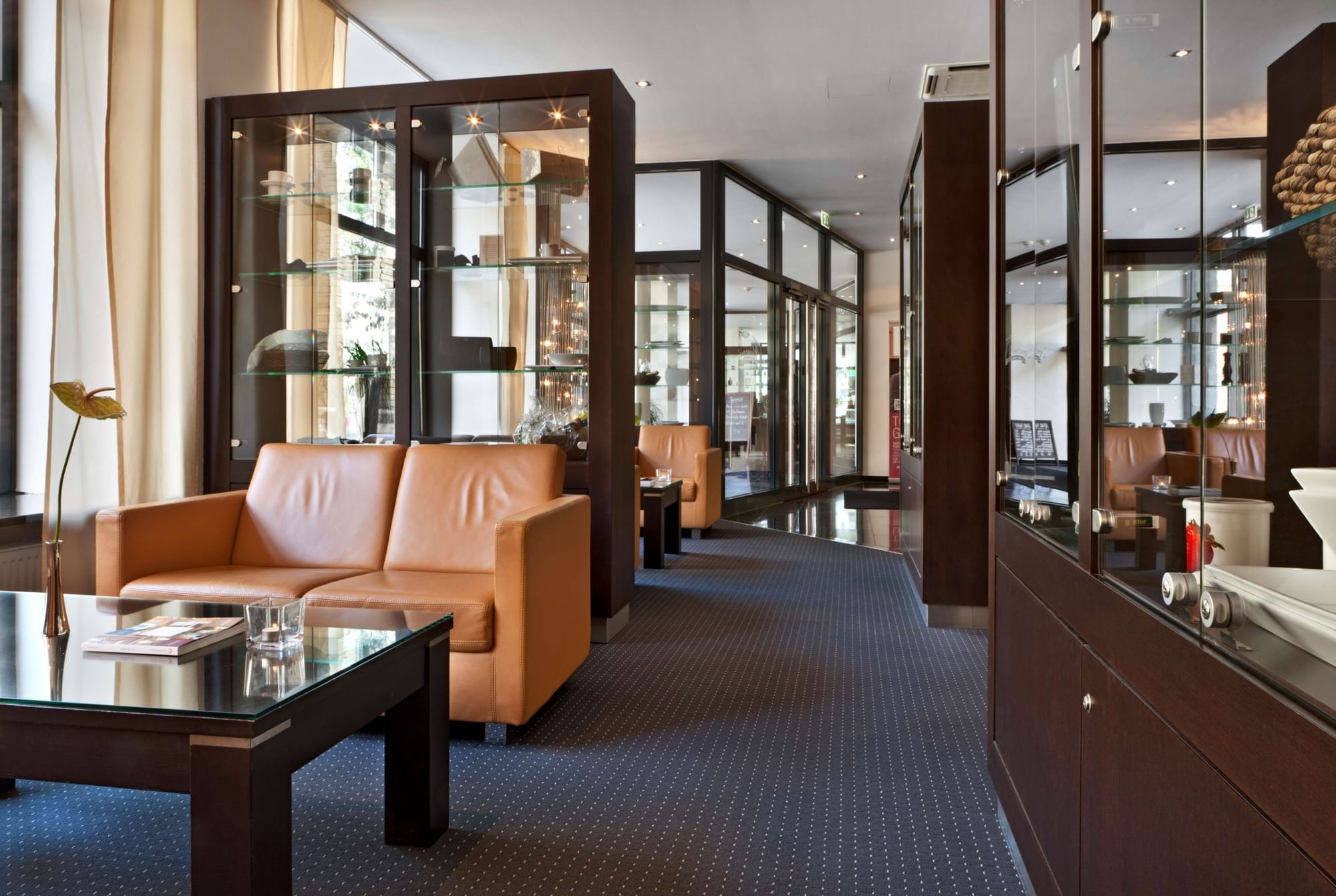 Lounge area with Chairs at Flemings Hotel München City