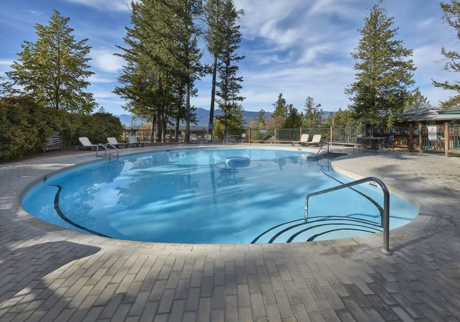A relaxing hot tub surrounded by calm nature at Fairmont Hot Springs Resort