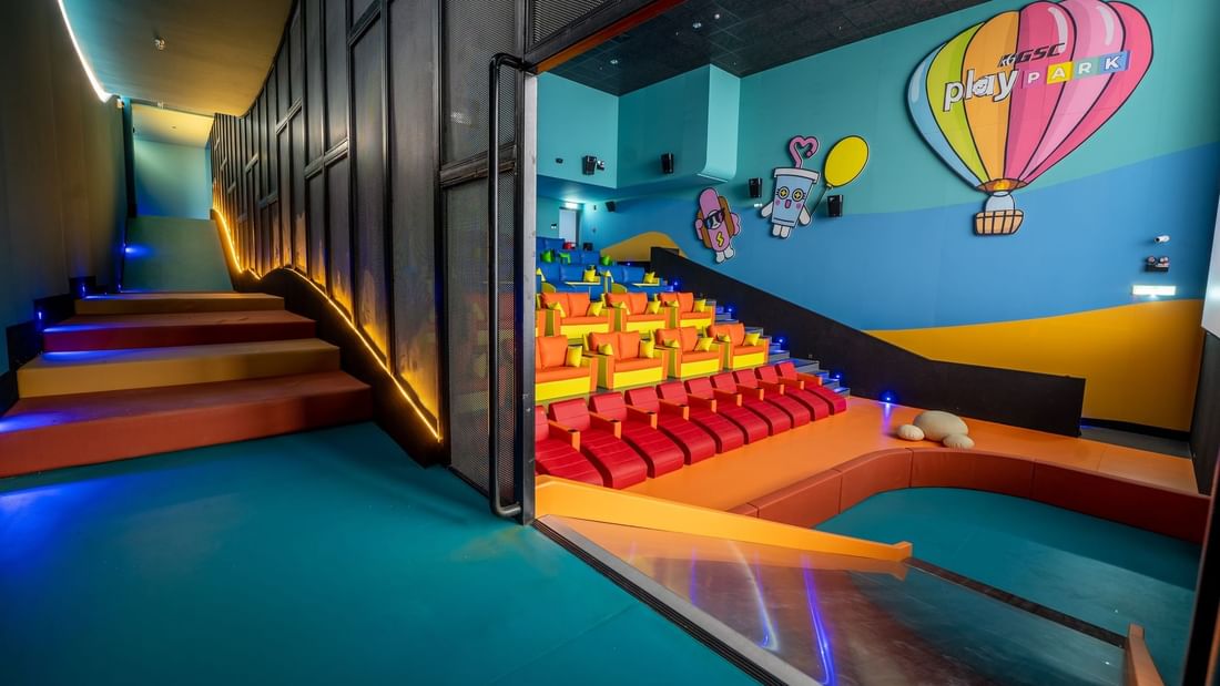 Colorful indoor theater seating area with playful wall art in GSC near Sunway Hotel Big Box