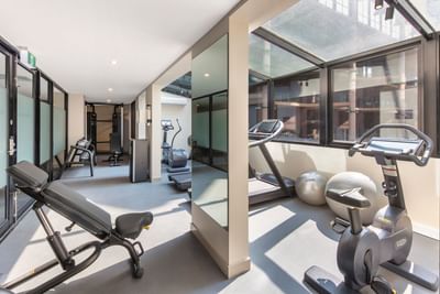 Fully equipped fitness center at Amora Hotel Melbourne