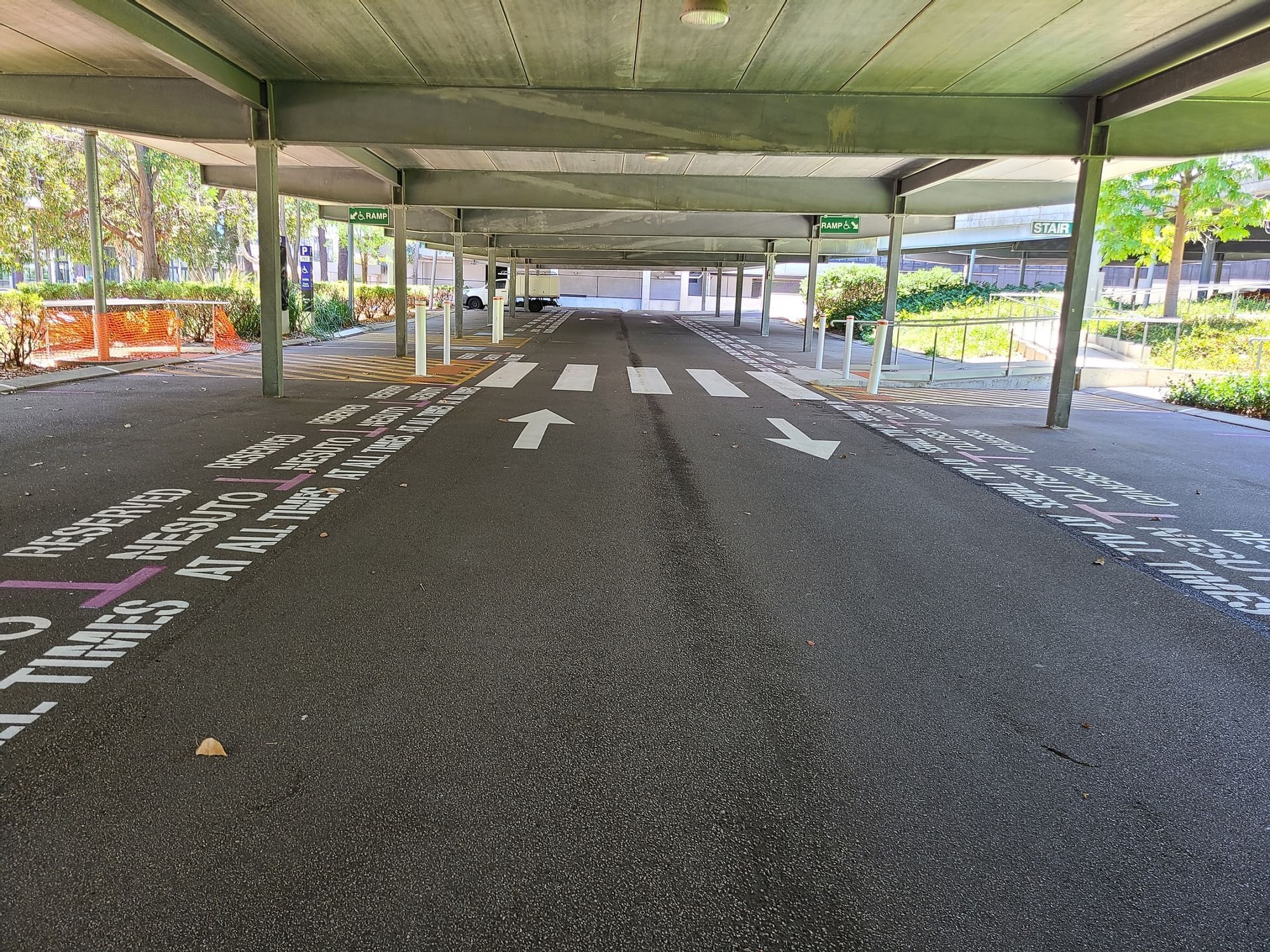 Interior of an indoor parking area at Nesuto Curtin Perth Hotel