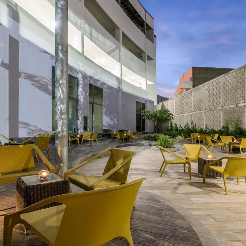 An open air dining & lounge area in Planta at DOT Hotels