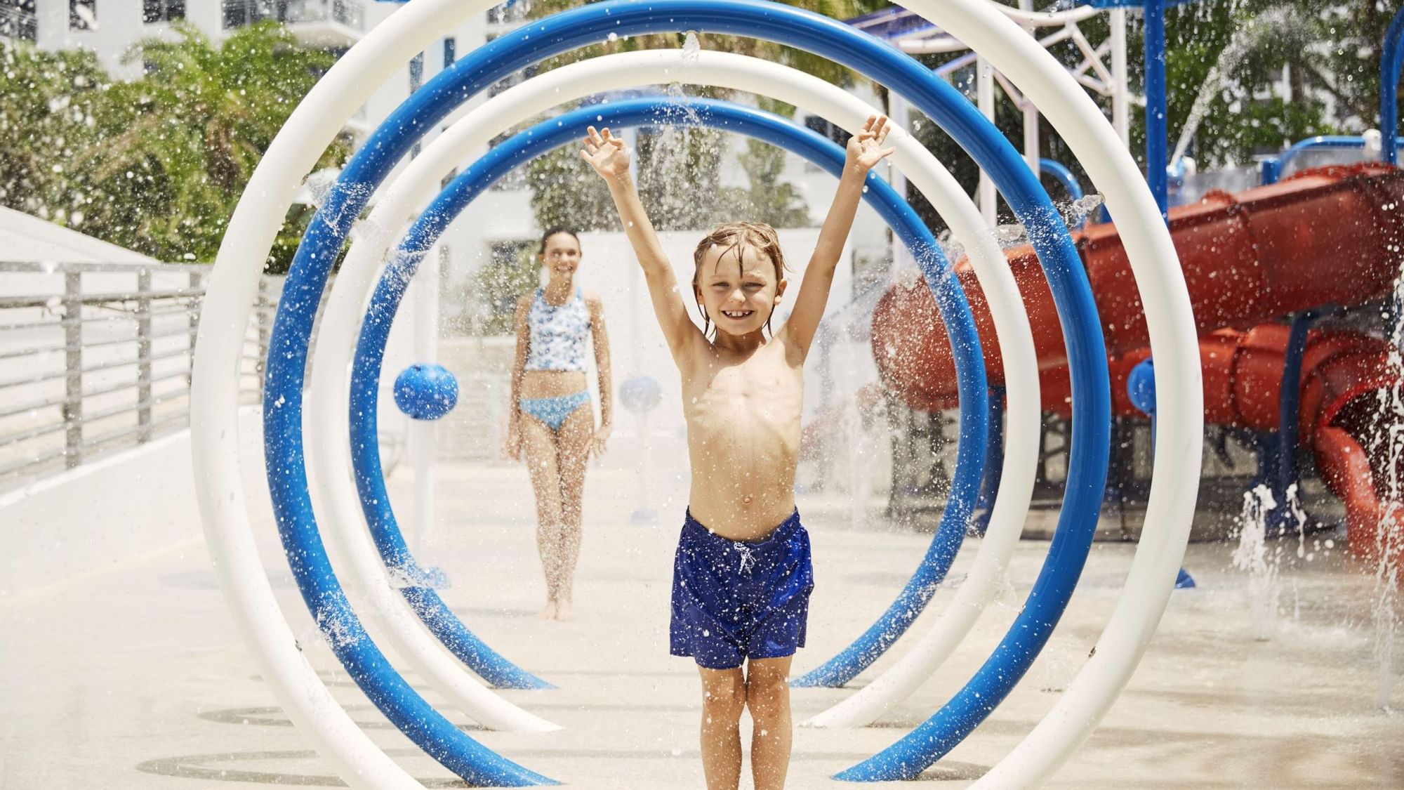 Kids enjoying in Slide Kid's Splash Zone at The Diplomat Resort