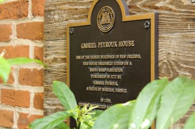 Plaque on the wall in front of Gabriel Peyroux House