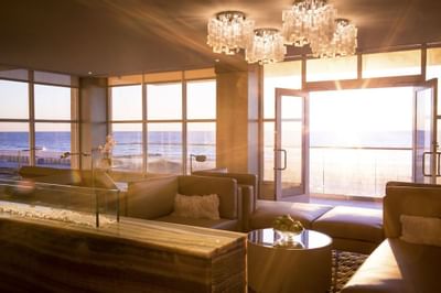 Interior of a luxury spa room at Ocean Place at sunset
