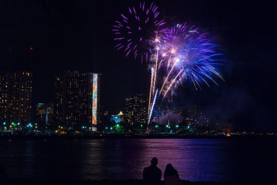 Colorful fireworks on the night sky near Stay Hotel Waikiki