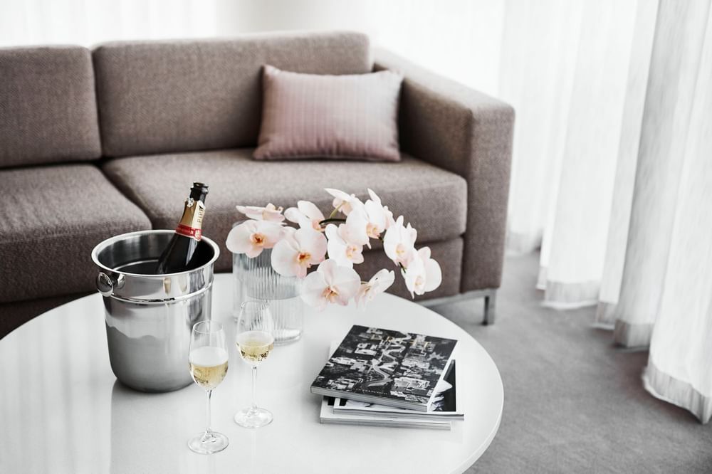 Wine & glasses served by a sofa at Crown Metropol Melbourne