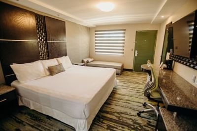 King bed with TV at Superior room at Araiza Hotel Calafia