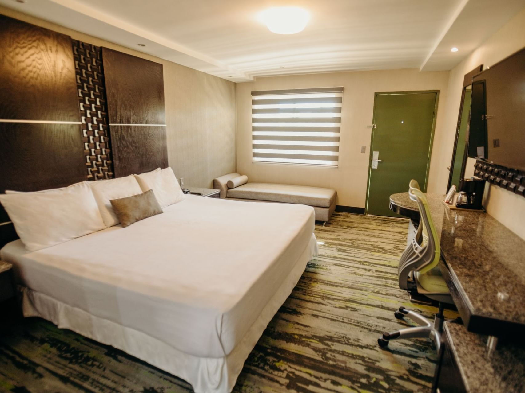 King bed with TV at Superior room at Araiza Hotel Calafia