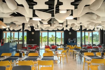 Dining area with set up tables in The Food Hub at The Hub Acunmeyda