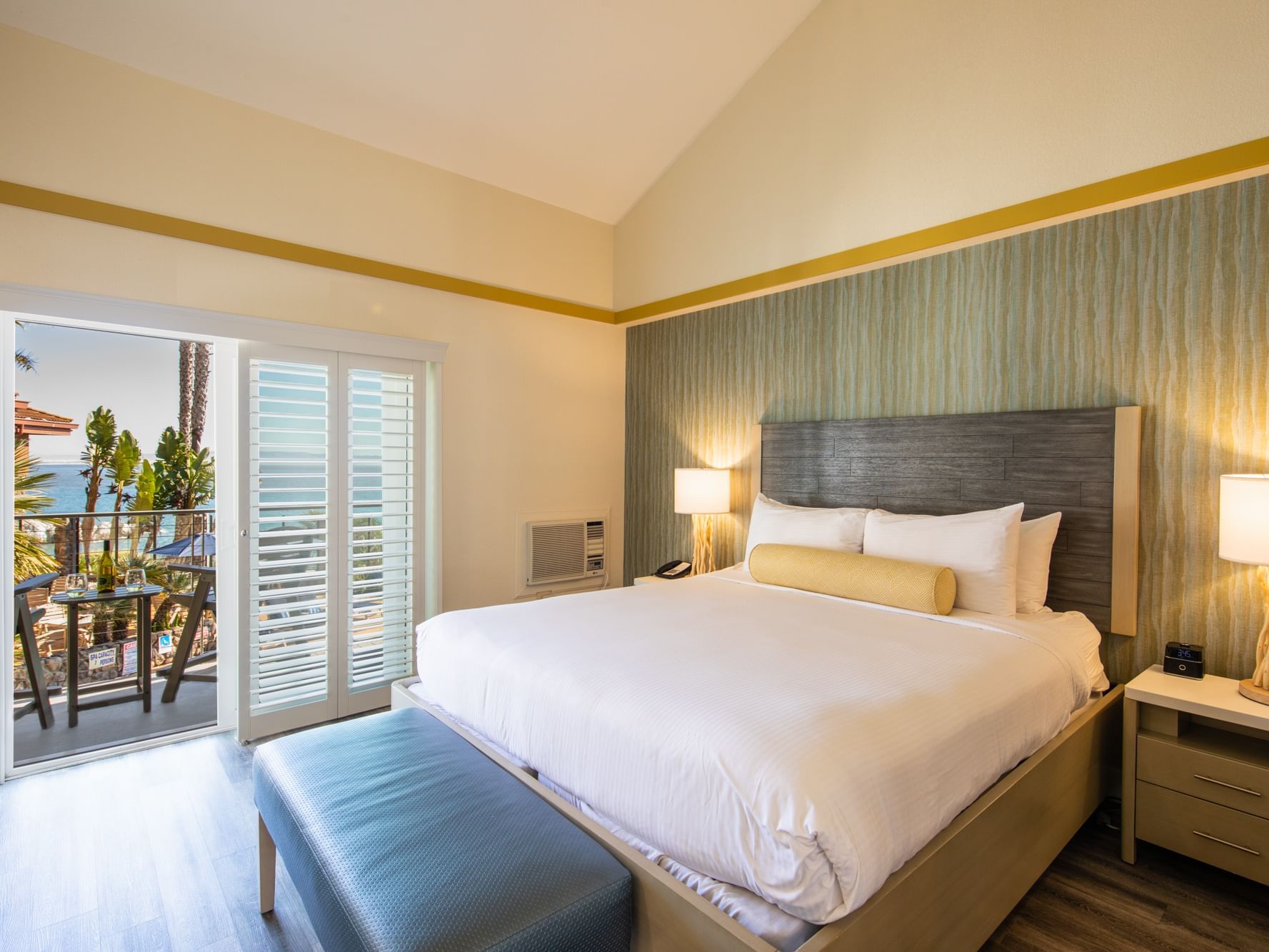 Oceanview Poolside King room with bed and outside access