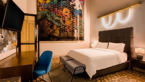 Bed & work desk in Deluxe Queen at Fiesta Americana Travelty