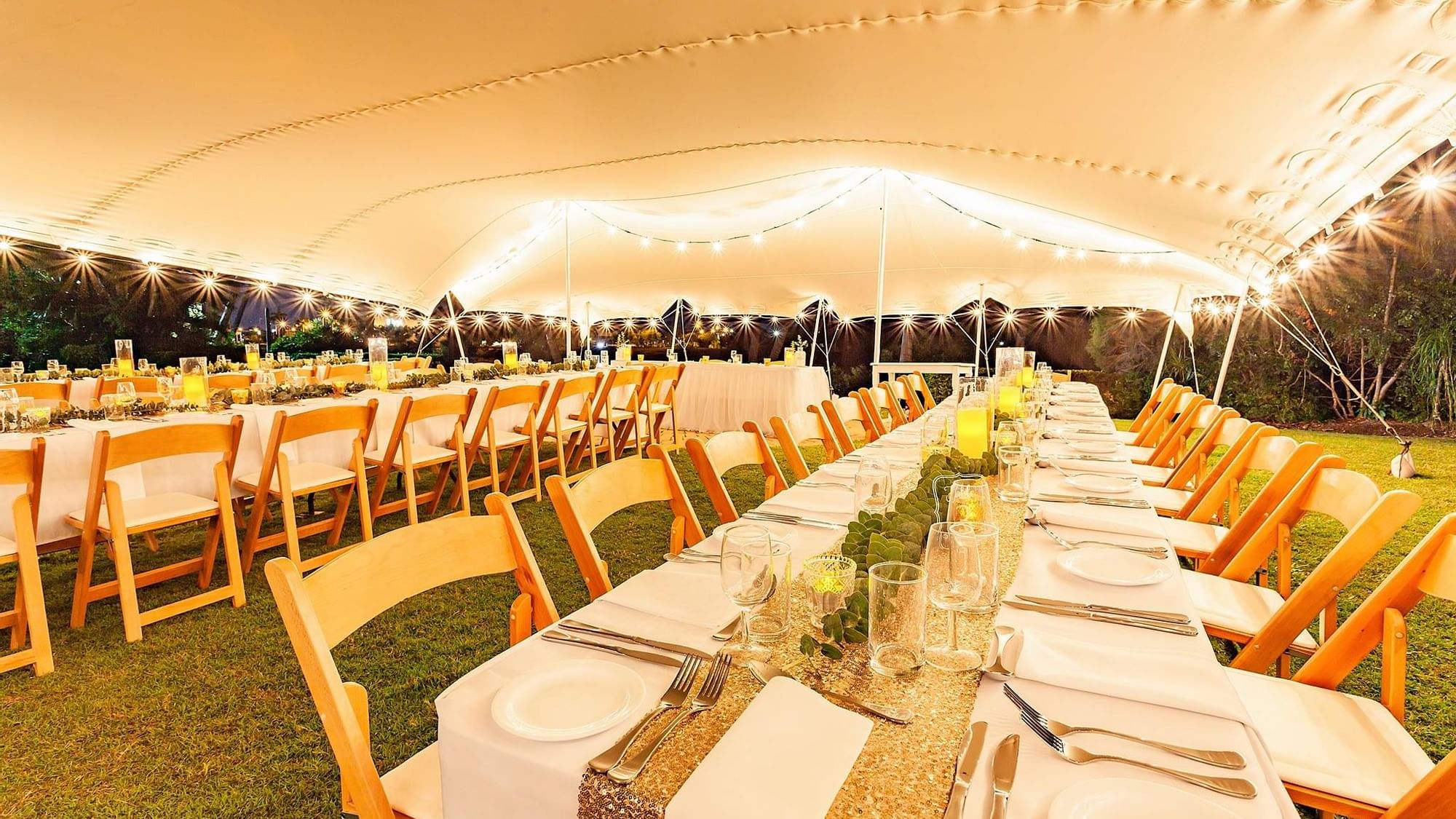 Table arrangement under a tent for wedding ceremony at Mercure Hotel Townsville