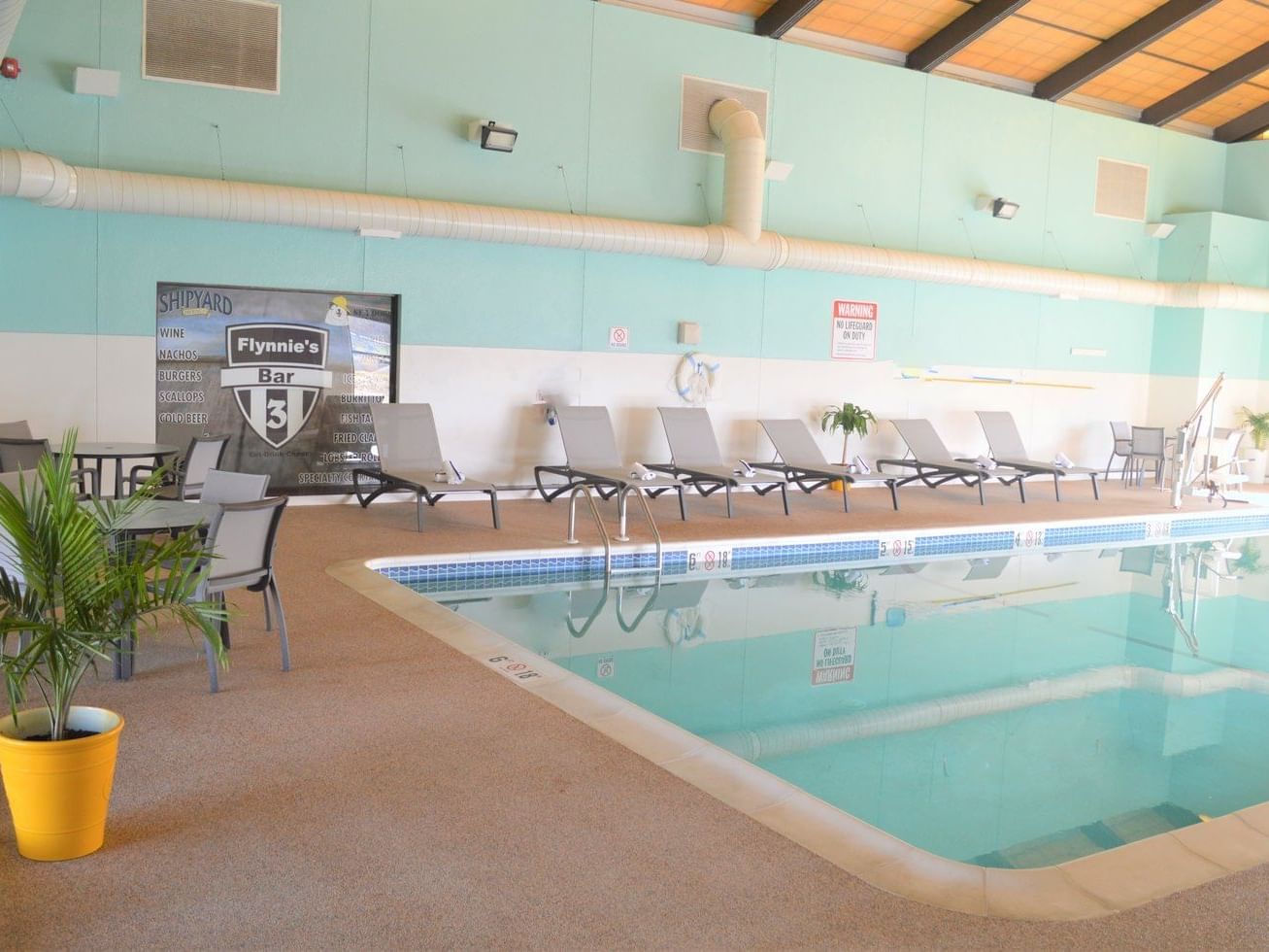 Indoor Pool with Lounge Chairs