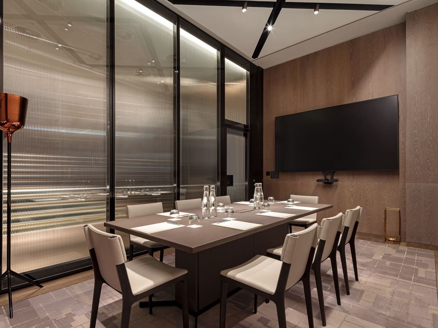 Meeting room with Boardroom table setup at The Londoner Hotel