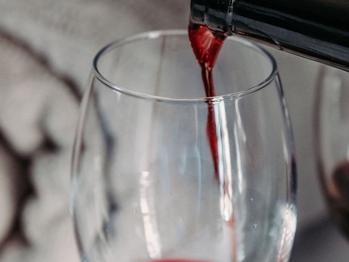 Wine glass pouring at Patton Valley wine dinner