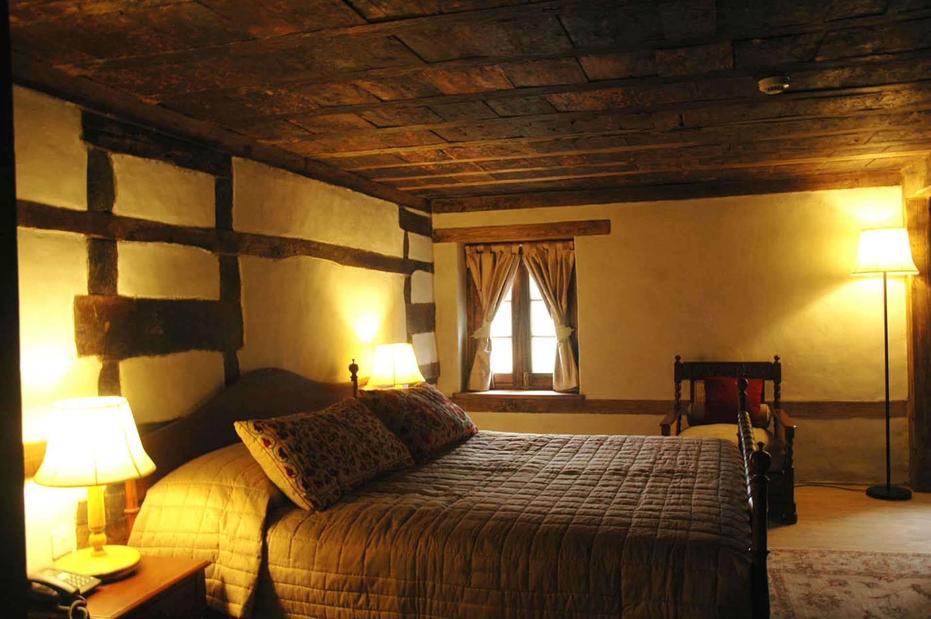 Interior of a bedroom in a hotel room at Serena Khaplu Palace