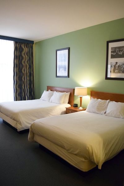 Interior of a room with twin beds at UMass Lowell Inn