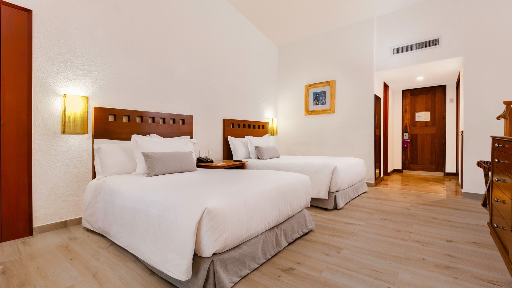 King Presidential Suite with two beds and wooden floors at Camino Real Guadalajara in Zapopan